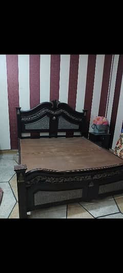 king size bed with dressing table and side tables