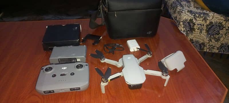 DJI mini 2 with fly more combo kit or 32 GB card free 4