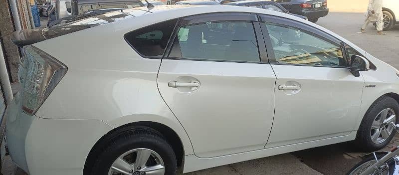 Toyota Prius 2010/2014 Perl White. 9