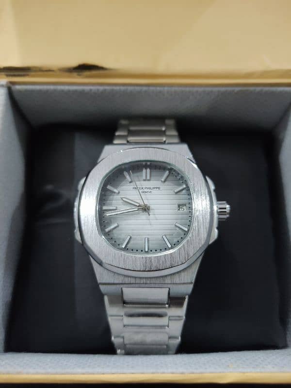 Patek Philippe Geneve Nautilus Swiss Made Automatic Transmission 0