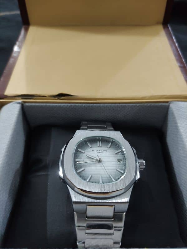 Patek Philippe Geneve Nautilus Swiss Made Automatic Transmission 1