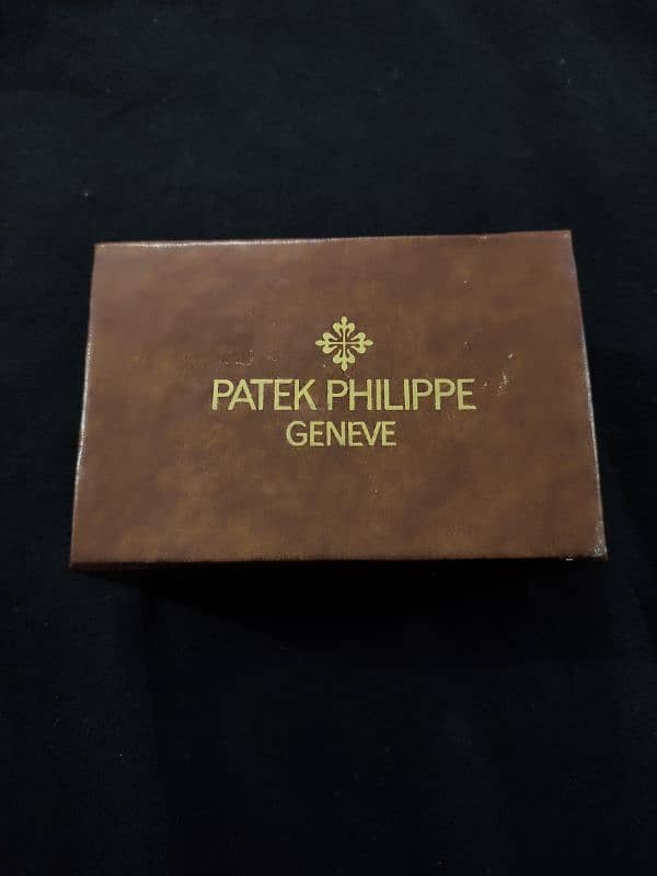 Patek Philippe Geneve Nautilus Swiss Made Automatic Transmission 5