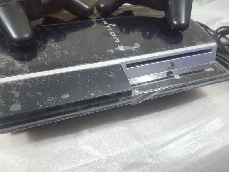 500gb ps3 45 games installation with 2 remotes wireless 3