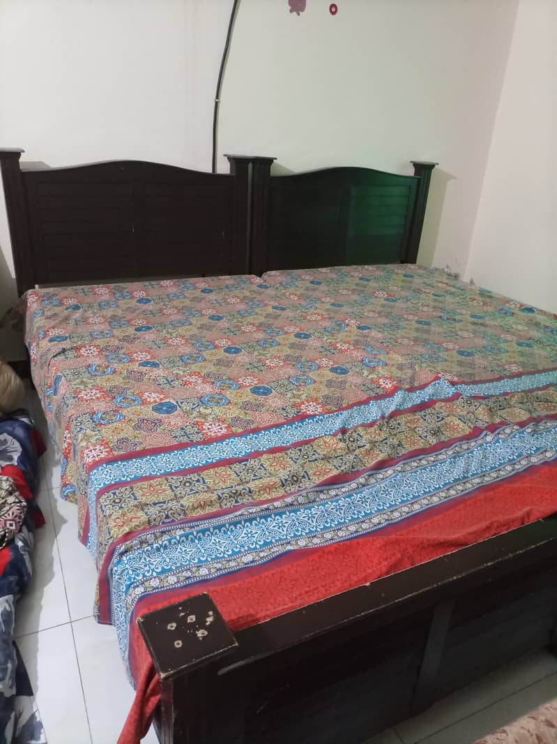 Single wooden bed pair 0