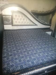 king size bed with. Siad table. dressing. divider