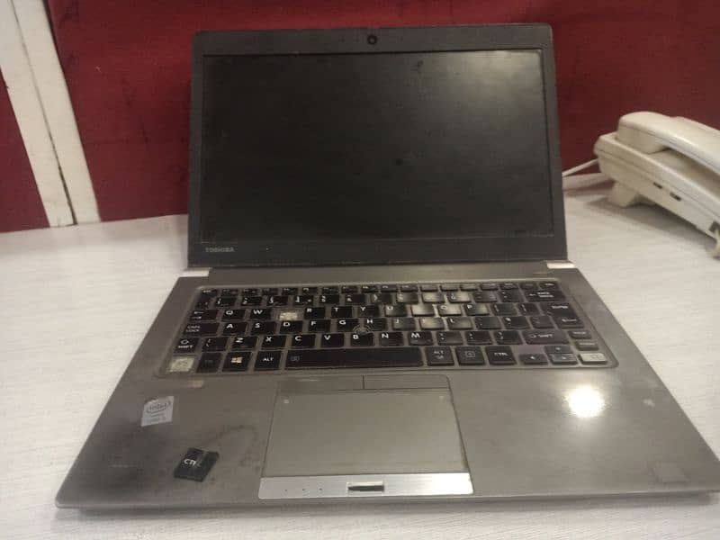 Toshiba laptop core i5 exchange possible with phone 12