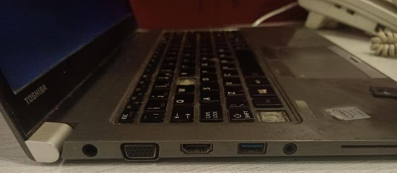 Toshiba laptop core i5 exchange possible with phone 15