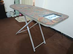 1 pc foldable and adjustable iron table stand. 0