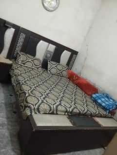 king size bed with spring mattress 2 side tables and dressing table