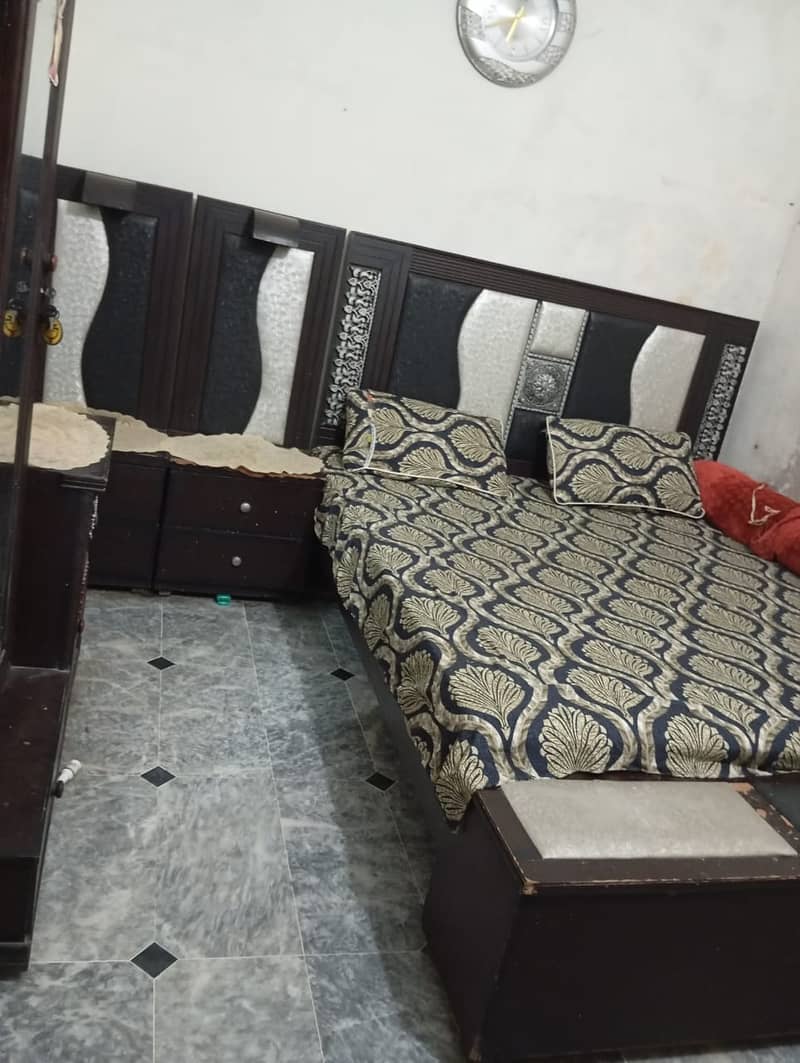 king size bed with spring mattress 2 side tables and dressing table 3