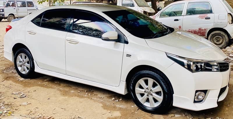 Toyota Corolla Altis 2015, Golden Registration No 6