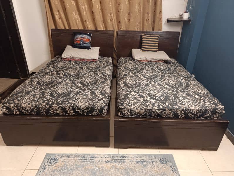 Two Single beds with siders and mattresses 0