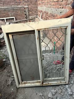 5 Iron Windows and 1 Iron Door in Good Condition