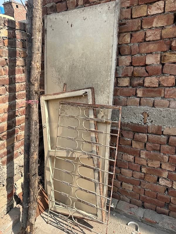 5 Iron Windows and 1 Iron Door in Good Condition 5