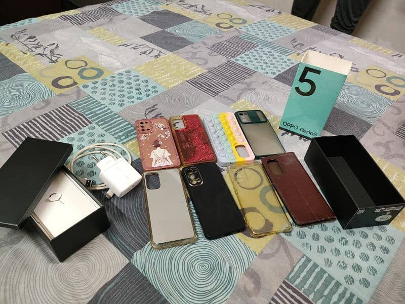 Oppo Reno 5 with 8 back covers 10/10 condition urgent sale 2