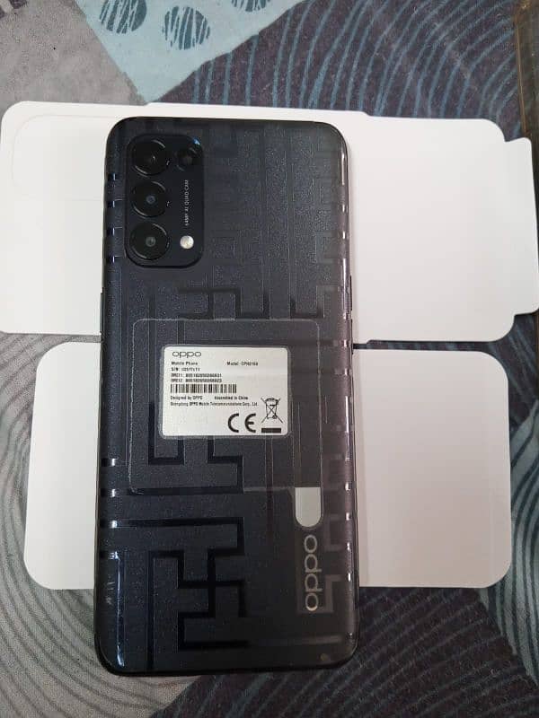 Oppo Reno 5 with 8 back covers 10/10 condition urgent sale 7