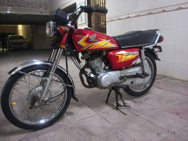 Honda 125 Karachi number 7