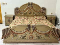 bed and dressing with side tabel