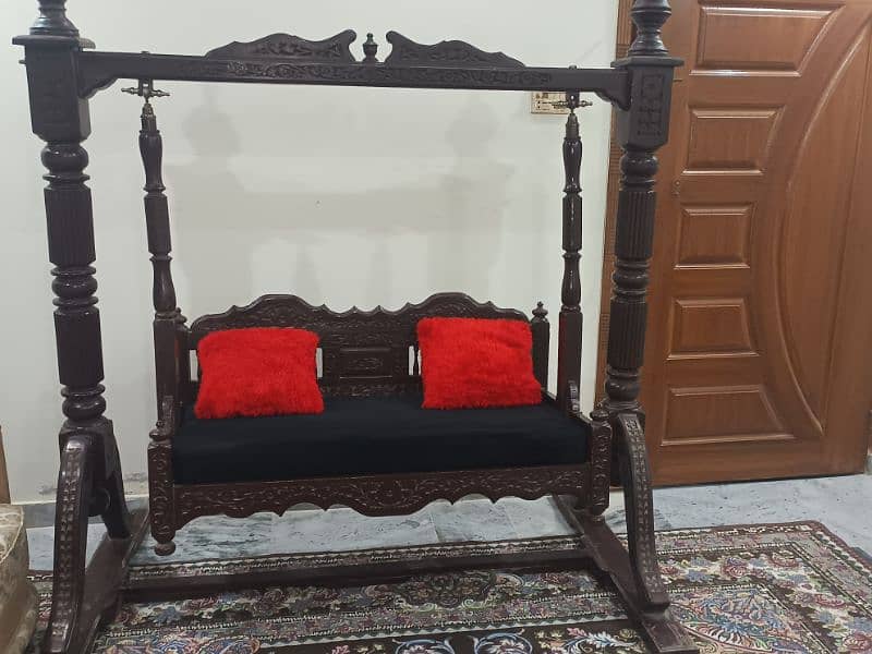 A beautiful wood swing for sale 3