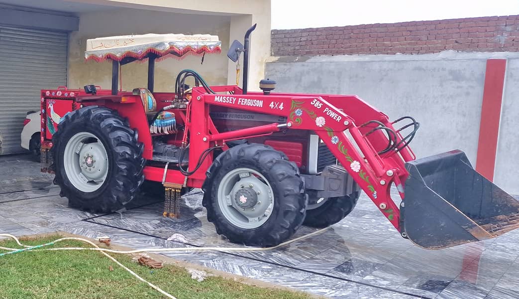 Mf 385 4x4 tractor with bucket 0 meter 0