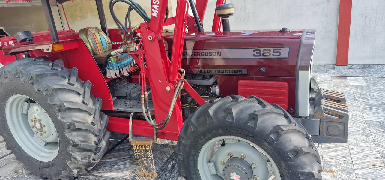 Mf 385 4x4 tractor with bucket 0 meter 10