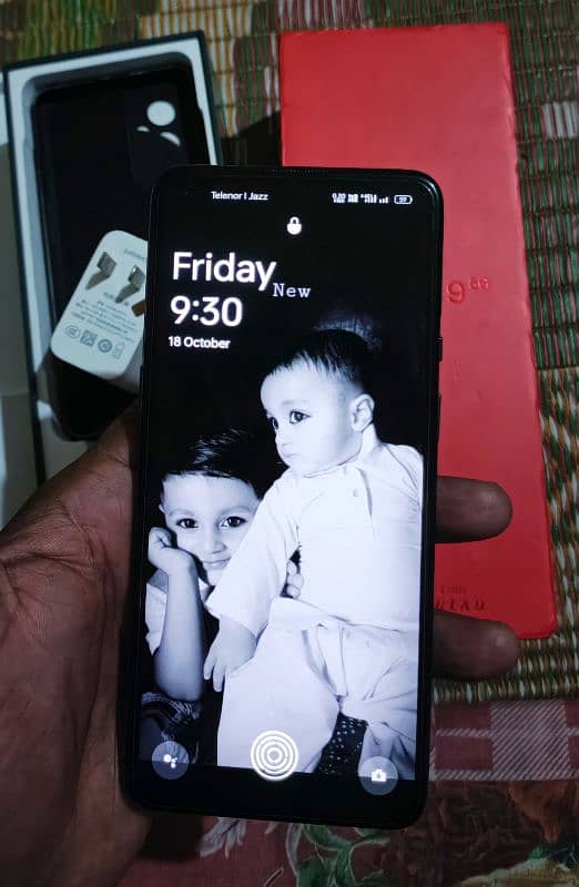 Oneplus 9 5g 12+12gb 256gb with all assesres offical pta pay tax 57k 3