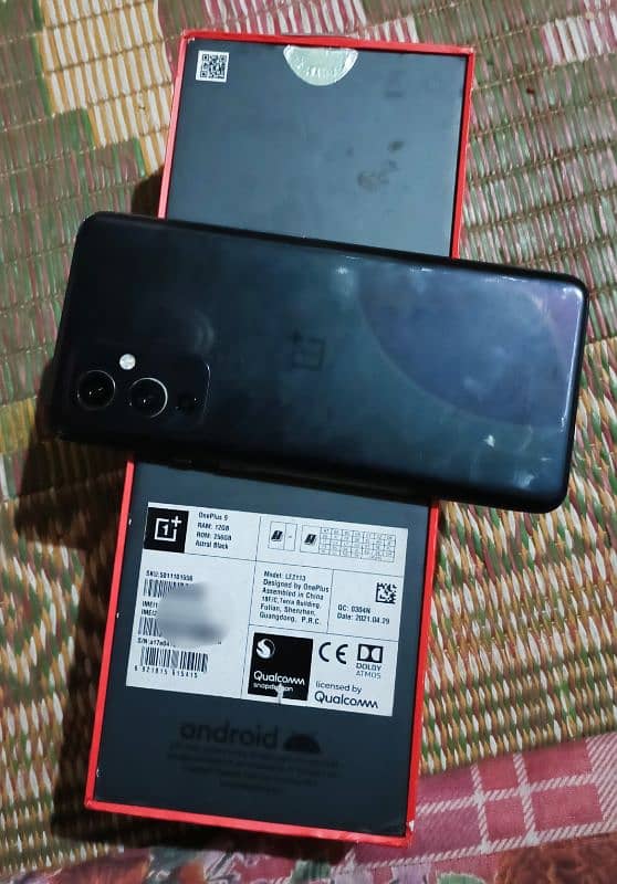 Oneplus 9 5g 12+12gb 256gb with all assesres offical pta pay tax 57k 6