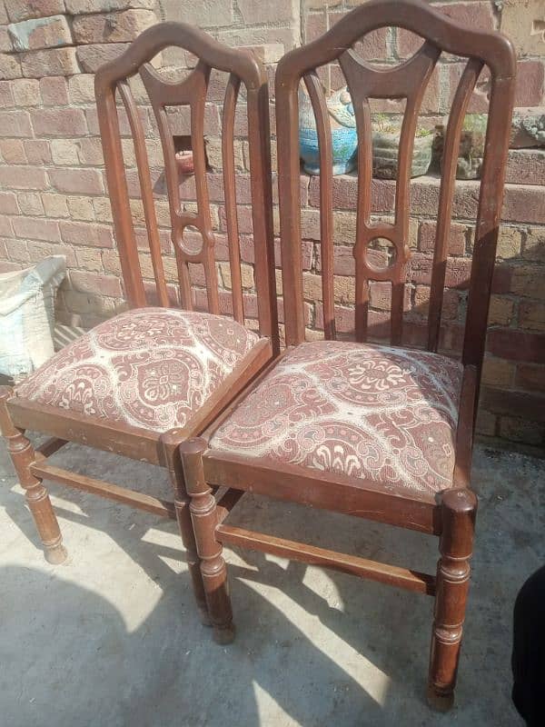 A dining table with 8 chairs 6