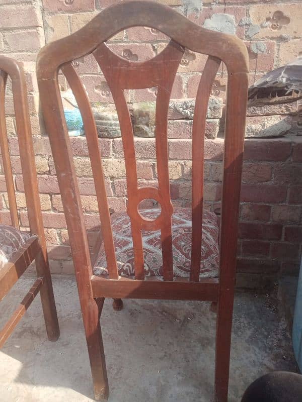 A dining table with 8 chairs 7