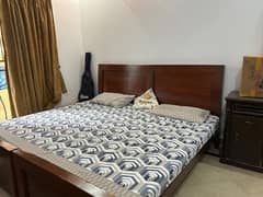 2 wooden single beds for sale