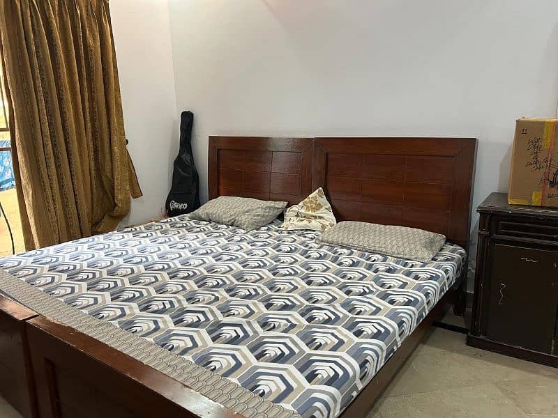 2 wooden single beds for sale 0