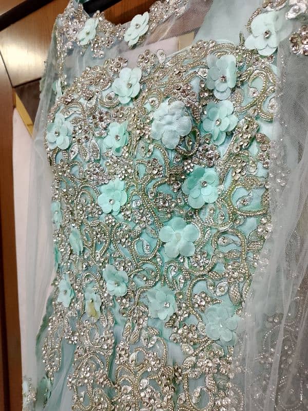 long frock with golden embroidery sky blue color with dupatta & inner 1