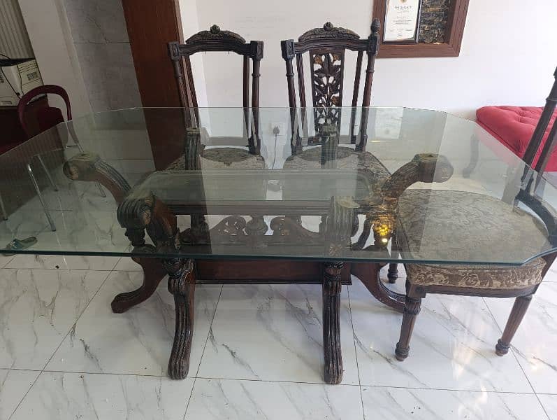 Glass dining table with 06 Chairs 1