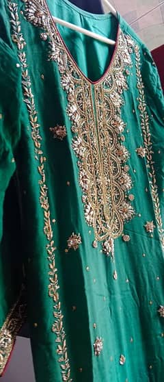 Bottle green long shirt with shalwar and organza dupatta