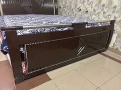 Wooden King bed on a reasonable price