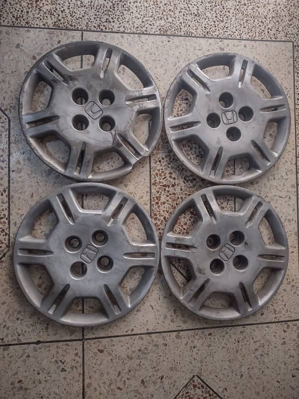 Genuine wheel cap honda Rim size 14". 1