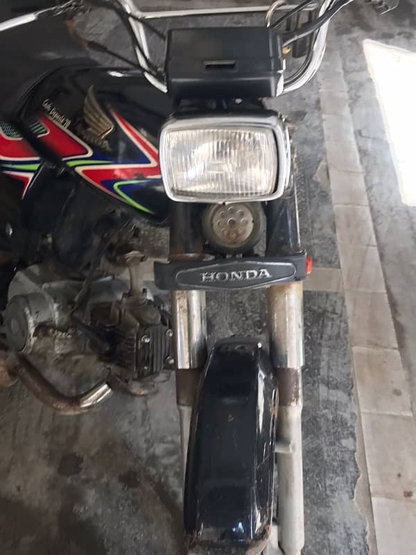 honda cd 70 mode 2017 october . black karachi registered . 2