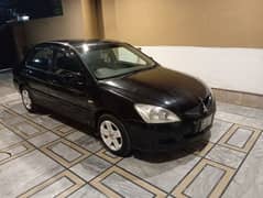 Mitsubishi Lancer 2005,ptrla vrge 14,15.