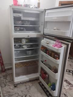 Dawlance 16 cubic ft Refrigerator fully functional for urgent sale.