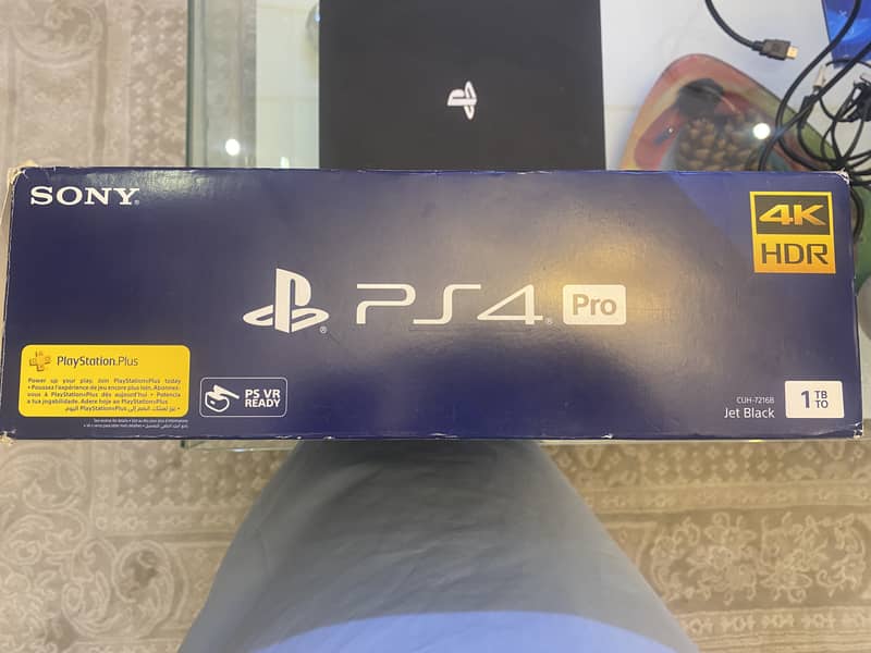 Used Sony PlayStation 4 Pro console and 2 controllers 2