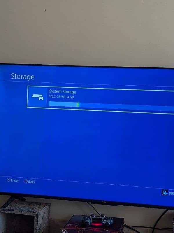 PS4 fat version. 1 TB storage with 2 controllers 1