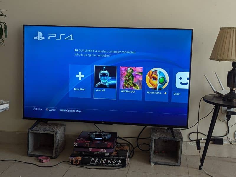 PS4 fat version. 1 TB storage with 2 controllers 2