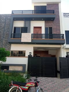 5 mrle portion available for rent faisal town