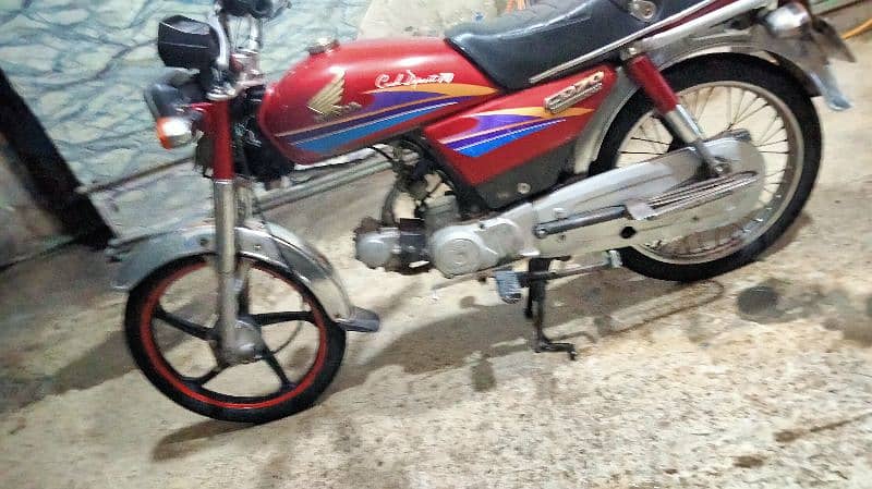 HONDA CD 70 TOTALLY genuine 2008 golden number 7