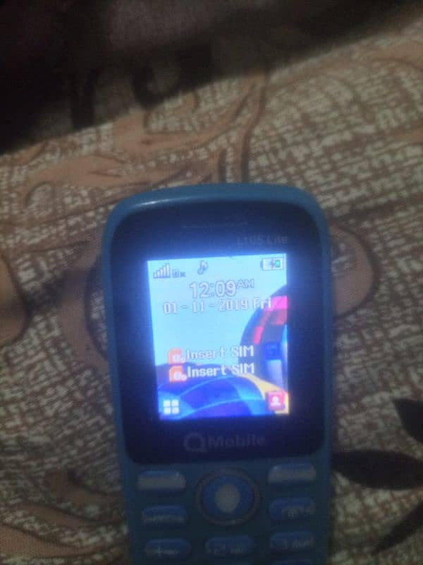 Q mobile L105 lite 4