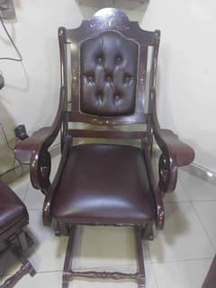 Rocking chair with movable foot rest