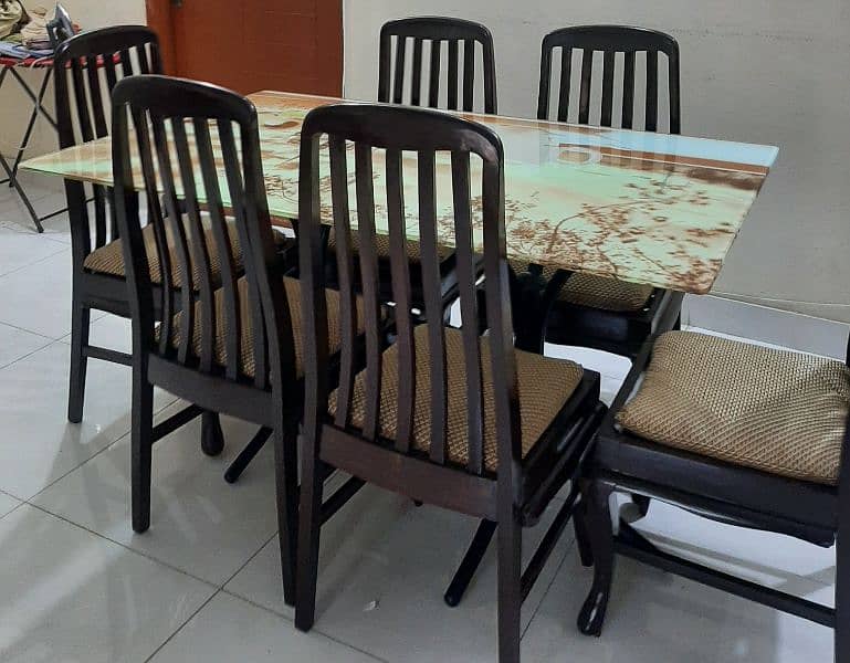 glass top dinning table with 6 wooden chairs 0