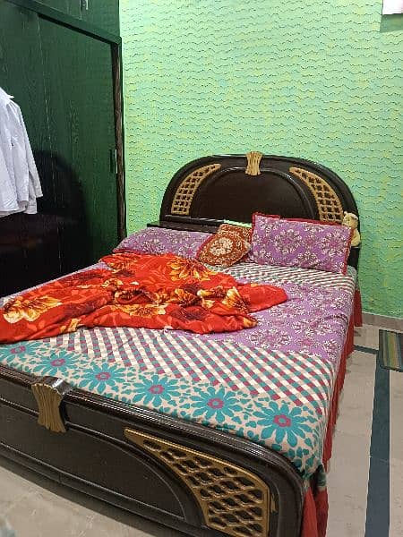 1 Double Bed alongwith mattress with 2 side Tables 3