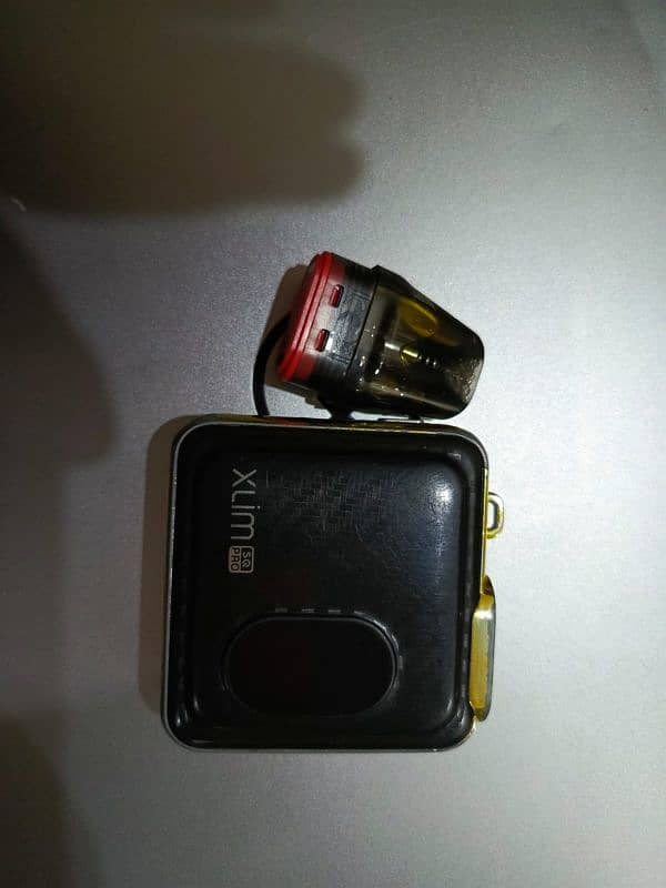 oxva xlim sq pro with new coil 0.4 and button smoke work 30 watt pod 1