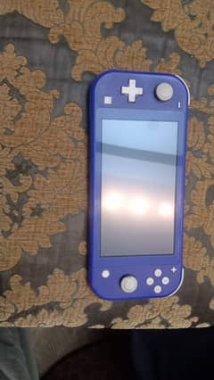 Nintendo Switch Lite (Blue) + 2 Popular Games! 